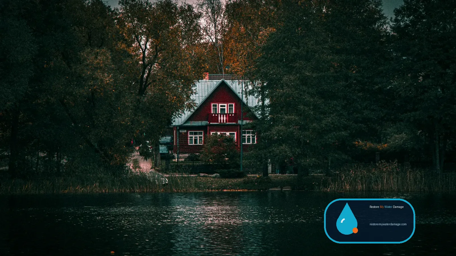 Red house among trees beside a lake, a property type for water damage restoration Gastonia Gaston County, NC