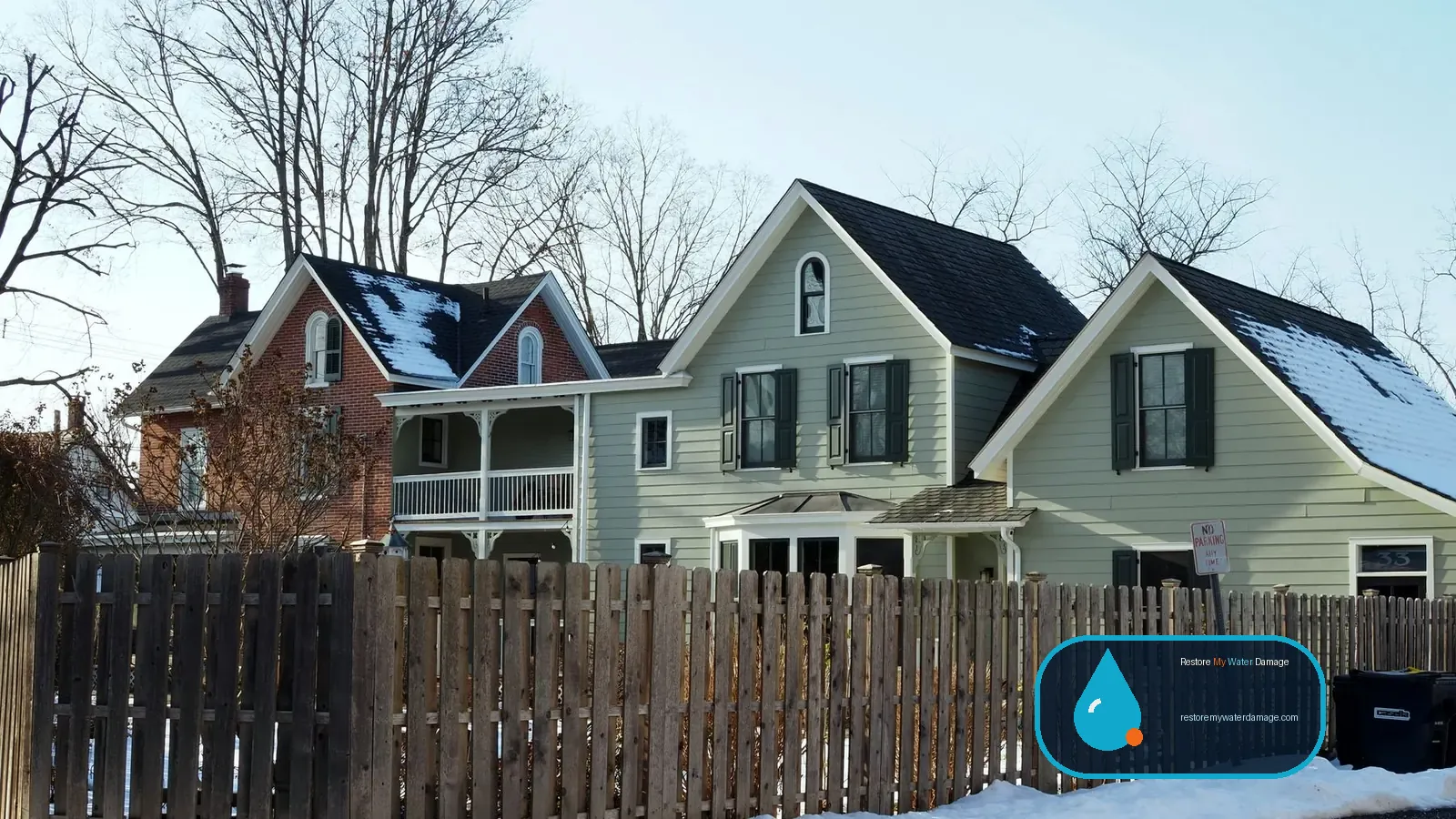 Older brick and frame homes on a wintry street, typical of water damage restoration Lehigh Valley Bethlehem jobs