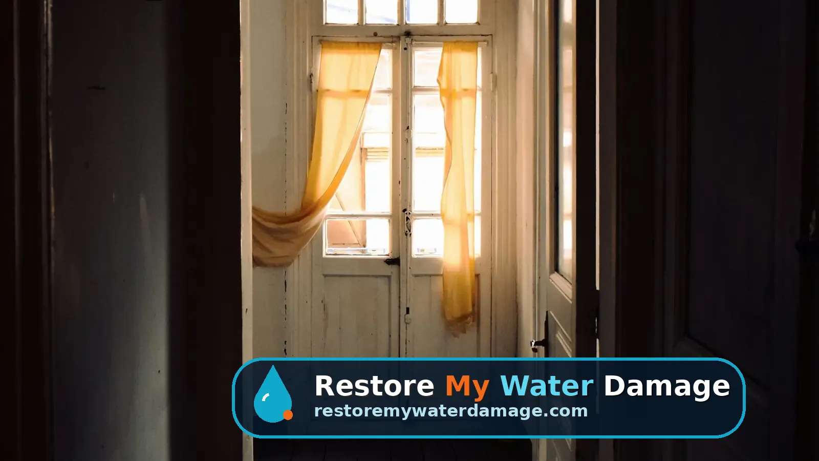 Narrow hallway with worn hardwood floorboards, the kind of space water damage restoration Philadelphia crews dry out