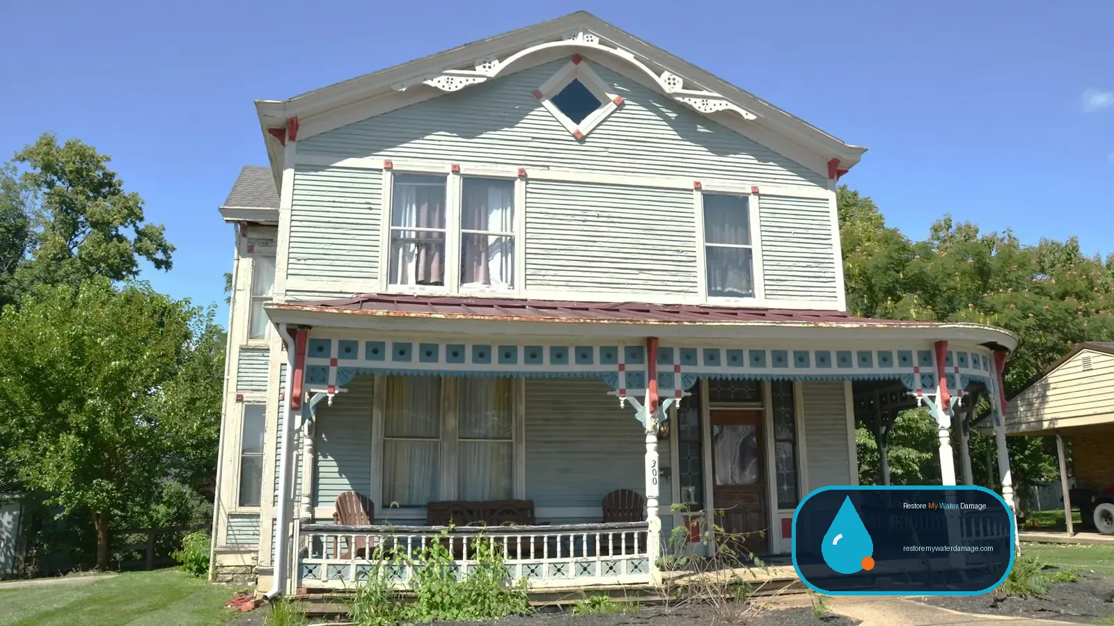 Victorian house with a wraparound porch, served by water damage restoration Salisbury Iredell-Rowan Corridor, NC